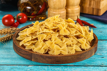 Raw dry farfalle for cooking