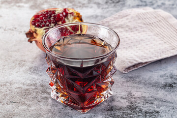Sweet vitamin pomegranate juice glass