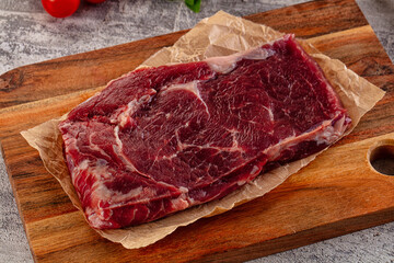 Gourmet raw rib eye steak