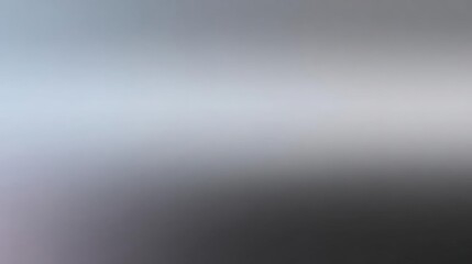 Obraz premium Abstract background with a gradient effect. the colors are predominantly gray and white, with the majority of the image being a light blue and the rest being a darker grey.
