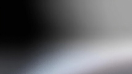 Fototapeta premium Black and white abstract background with a gradient effect. the left side of the image is black, while the right side is white.