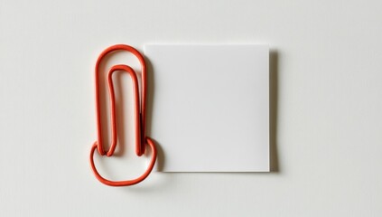 Red Paperclip On White Sticky Note