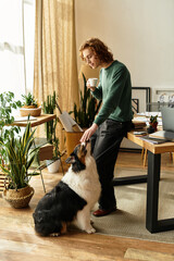 Cozy morning at home with a young man enjoying coffee while bonding with his dog