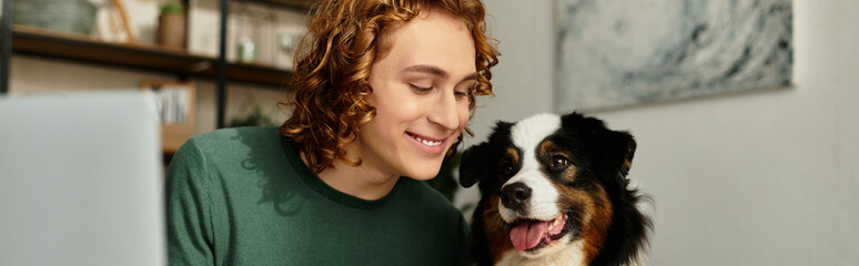 Young man enjoying quality time at home with his affectionate dog in a cozy setting