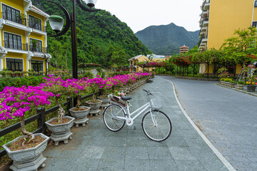 Vietnamese Picturesque Village Near River Among Mountains And Jungle