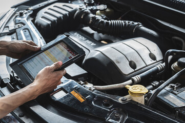 Car scanner service ,car scanner diagnostic tool service in garage service shop.