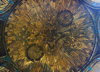 building detail in straw wood and cain with pine cones