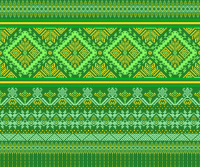 Elegant traditional Thai fabric silk geometric ethnic oriental cross stitch style with golden Thai ornament seamless pattern on green background. 