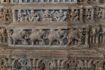 Ancient marble carvings depicting elephants and religious figures at Ranakpur Jain Temple