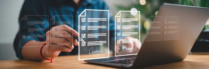 Person digitally signing documents on a laptop.