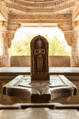 Ancient jain statue representing divinity in Ranakpur temple, Rajasthan, India