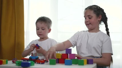 Children build blocks together room at home. Develop skills while playing with blocks home promoting creativity and problem solving room. blocks encourage children learning family supports development