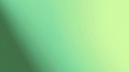 Obraz premium Close-up of a light green background. the color is a gradient of light green, with the majority of the image being a darker shade of green and the rest being a lighter shade of yellow.