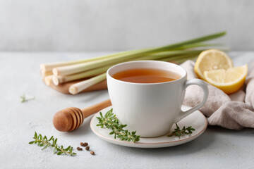 Soothing cup of herbal tea with fresh herbs, lemon, and honey, perfect for relaxation