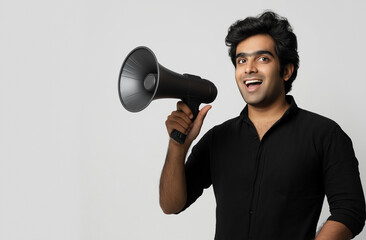 Young Handsome Indian Man with Megaphone – Sales Promotion & Advertising Concept, High-Resolution Studio Stock Photo with White Background & Copy Space