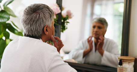 Home, mirror and old woman with skincare, stress and dermatology with anti aging. Pensioner, beauty...