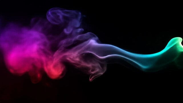 Abstract Colorful Smoke Swirls on Black Background - A vibrant video featuring multicolored smoke swirling and flowing against a stark black background.