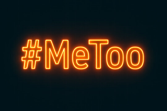 Neon sign displaying the hashtag metoo in bright orange against a dark background for social commentary