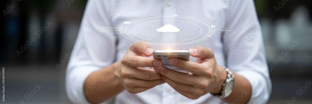 Poster person holding a mobile phone with a cloud computing interface.