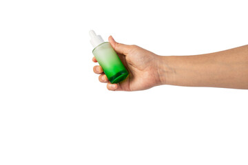 Green glass cosmetic bottle, Skin care or sunscreen cosmetic with hand on transparent background.