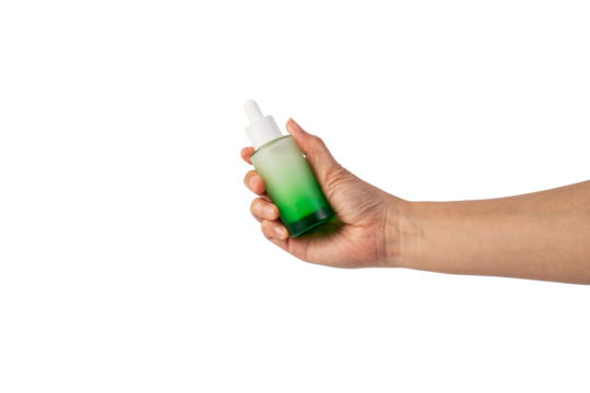 Green glass cosmetic bottle, Skin care or sunscreen cosmetic with hand on transparent background.