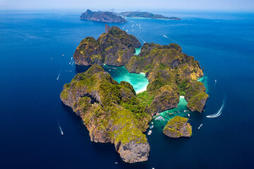 Obraz na płótnie Canvas Travel drone photo of Phi Phi Leh with Maya Bay and Pileh Lagoon, Krabi province, Thailand. Aerial top view of amazing tropical island with turquoise water and white beach