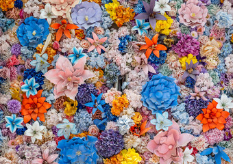 Close-up view of a densely packed arrangement of artificial flowers