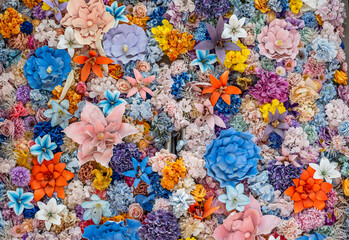 Close-up view of a densely packed arrangement of artificial flowers