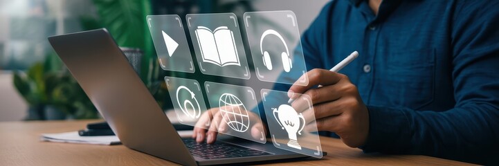 Person using a laptop with interactive educational icons.