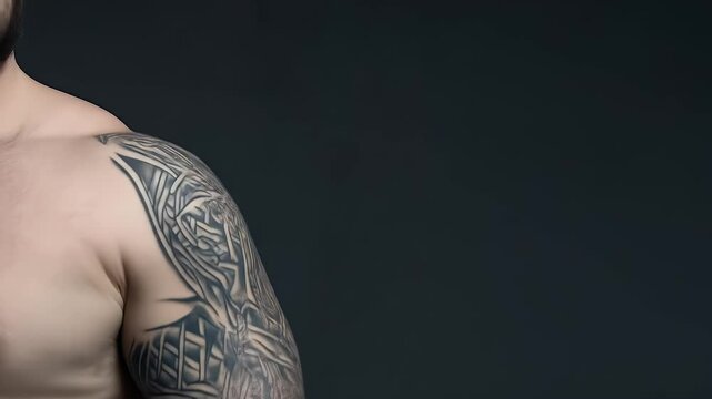 Large black and gray tattoo on a man's arm