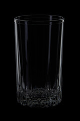 Empty tall glass on black background