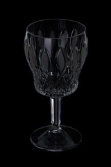 empty wide crystal tulip glass for champagne on black background
