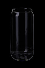 Empty thin glass beverage jar on black background