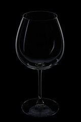 Empty wine glass on black background