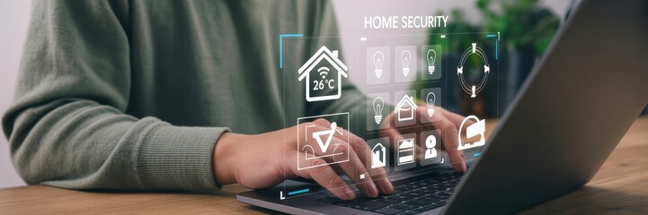 Person using a laptop with a home security interface overlay.