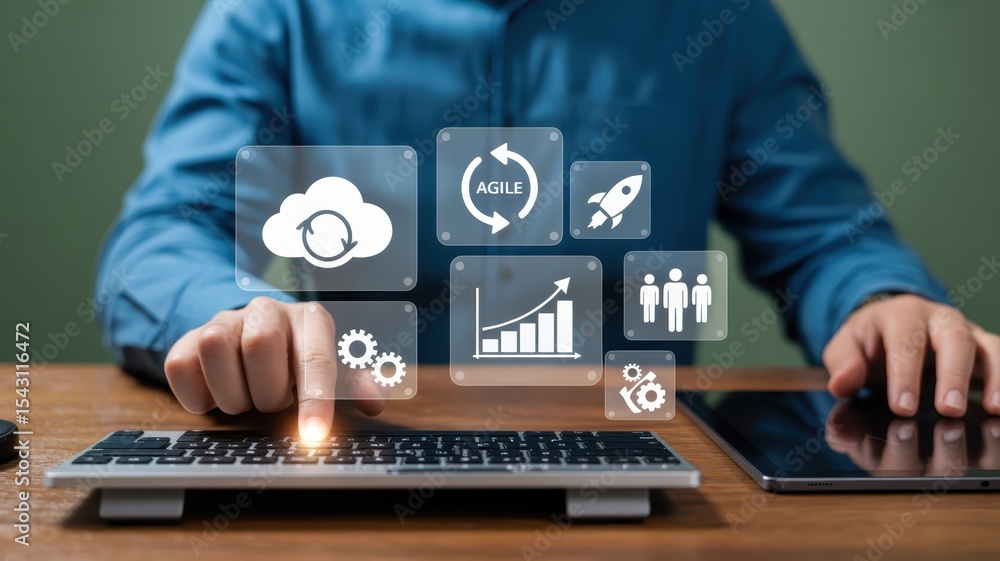 Poster person interacting with digital icons displayed on a computer screen.