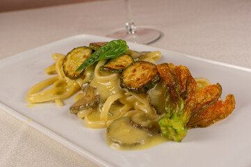 Spaghetti alla Nerano with Fried Zucchini and Basil Garnish