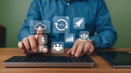 A person interacts with a touch screen interface displaying agile business icons.