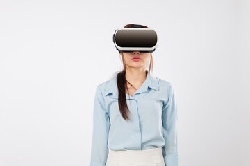 Young woman wearing virtual reality glasses explores future tech, excited asian girl using vr device and smiling, experiencing vr through innovative technology, isolated studio white background