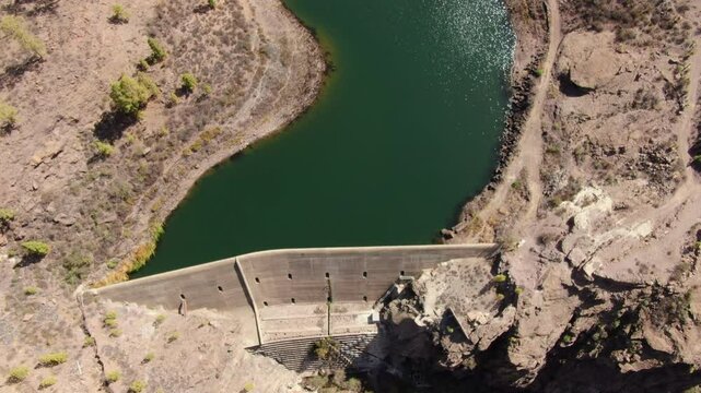Aerial view of El Mulato dam, a concrete gravity dam on the island of Gran Canaria