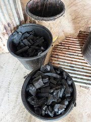 Charcoal in Buckets for Rural Cooking.