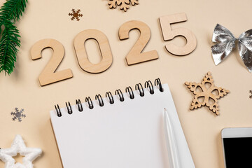 New Year Aims 2024. To Do List. Empty Notebook at the Desk with Holiday Decoration. Top view. Creating Plan, Resolution. New Life, Start Up, Beginning Concept. Business ideas. Goals, action, checklist