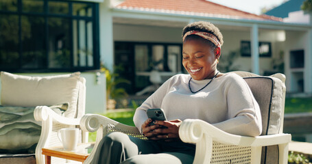 Backyard, laugh and happy black woman with phone on social media or online review. Guest house,...