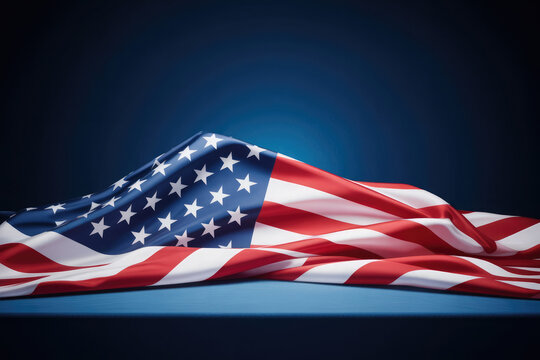 Draped american flag on a blue surface