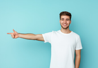 Excited Man in White T-Shirt and Jeans Pointing Left – Advertising Banner Mockup, Blue Background, High-Resolution Stock Photo for Marketing & Promotional Designs