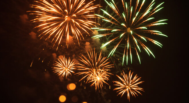 Spectacular Fireworks Display A Night Sky Illuminated with Burst of Colors