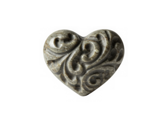 Stone heart with intricate carvings floats against a transparent background expressing love.