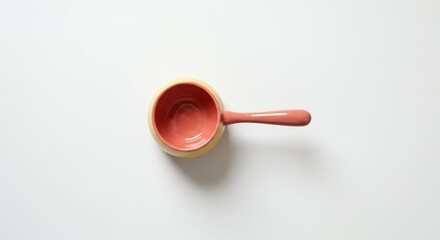 Small ceramic saucepan with pink handle