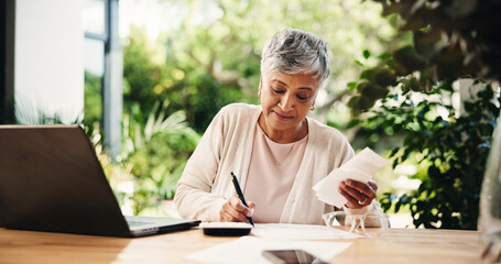 Laptop, writing and bills with old woman at home for retirement fund savings, pensioner asset and...