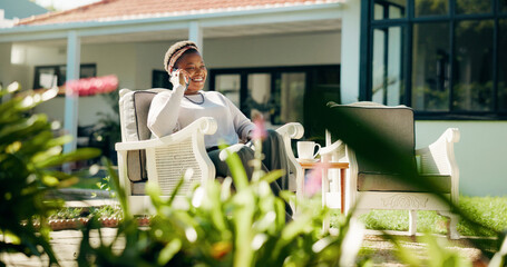 Phone call, relax and black woman in backyard for talking, contact and connection in house. Weekend, garden and happy person outdoor on smartphone for communication, networking and conversation